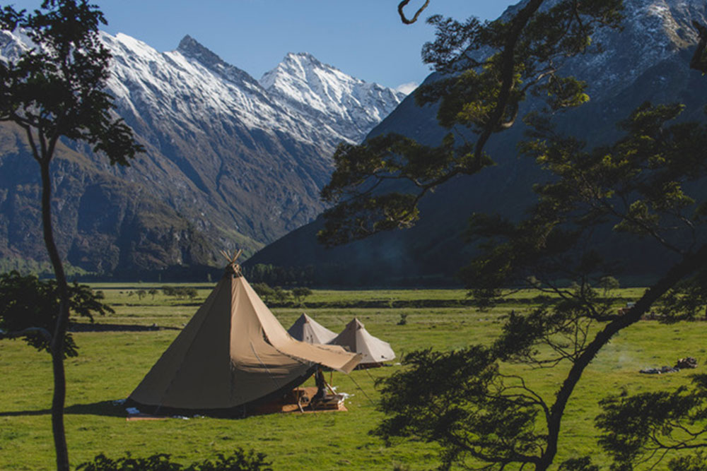 Gather and Gold tipi events - tipi set up with mountains in the background for the Jeep Wrangler launch event in Otago, New Zealand.