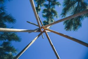 Gather and Gold hire a teepee tent - looking up at ceremony arbour to central point