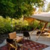 Gather and Gold teepee tipi - seating and rugs outside and open tipi