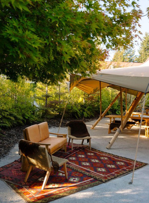 Gather and Gold teepee tipi - seating and rugs outside and open tipi
