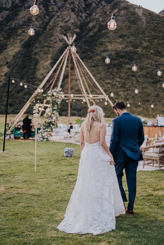 Bride and Groom at tipi wedding beside Moke Lake in Queenstown New Zealand, by Gather and Gold