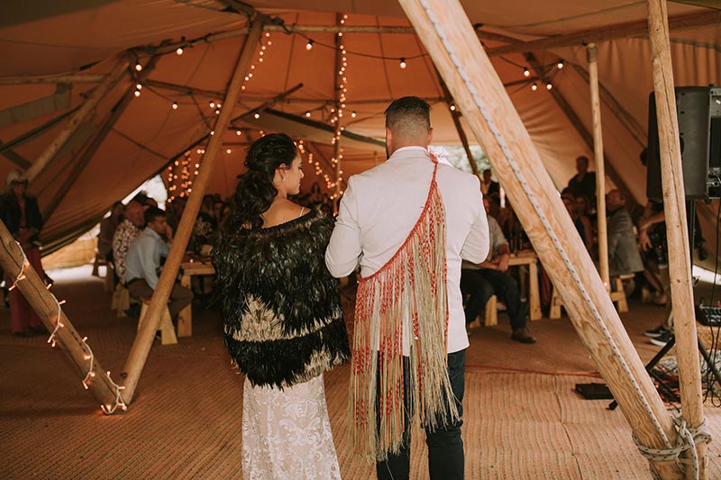 Modern Maori tipi wedding with Bride and Groom inside beautiful large tipi - tipi wedding by Gather and Gold