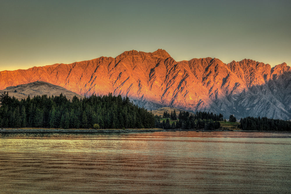 Gather and Gold teepee tipi - view of mountain and lake at sunset