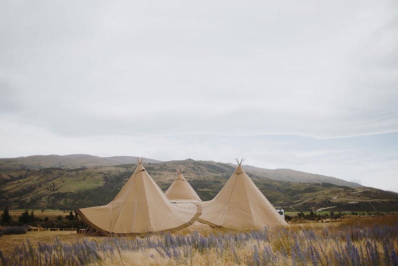 Idyllic setting for a Tipi wedding in New Zealand - 3 large tipis from Gather and Gold