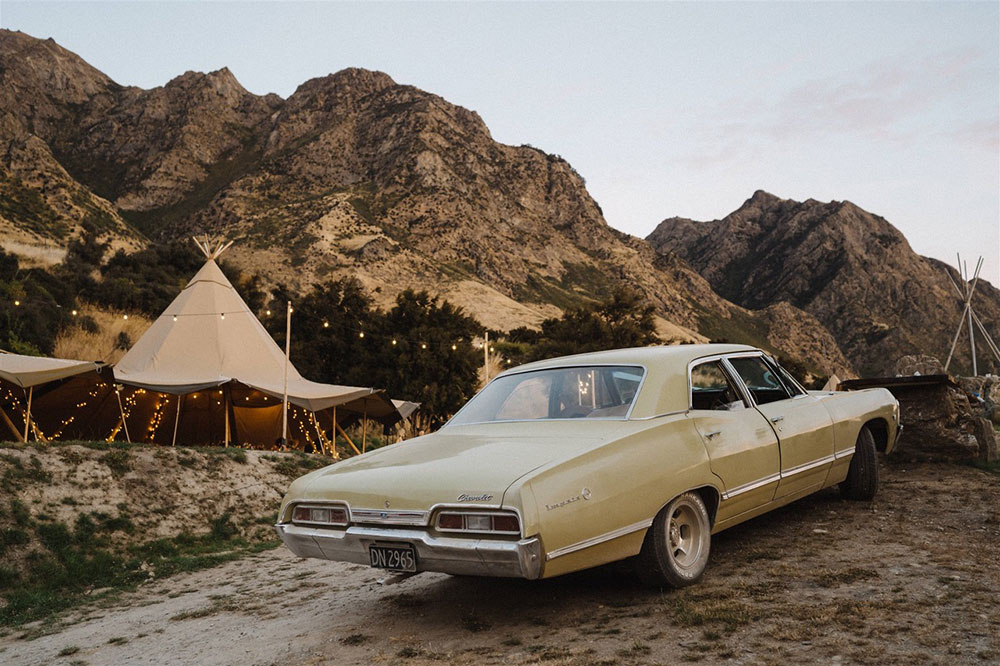 Tipi vs Marquee: Which is right for me? Tipi wedding with classic car