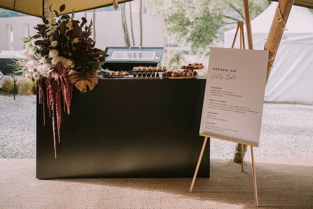 Gather and Gold Teepees recommends Flower, caterers and wedding planners in Queenstown and Wanaka - The Green Room floral arrangements, welcome bar and menu board in tipi.