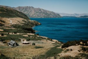 View across southern lakes in New Zealand with tipi wedding - The Good Folks’ Guide to a Queenstown-Wānaka Wedding