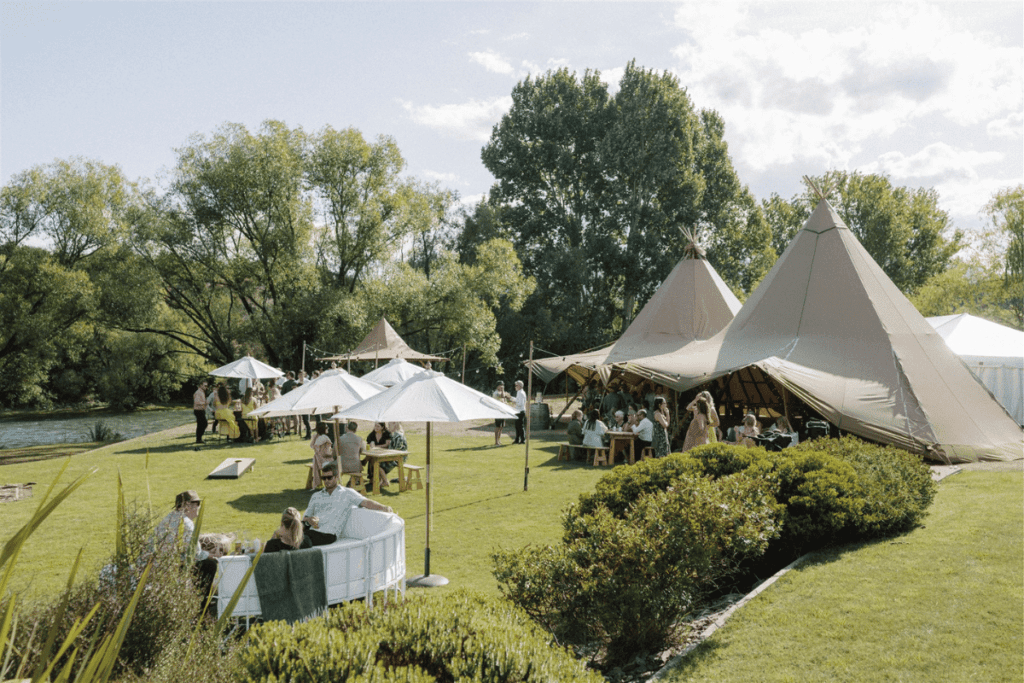 Two Tipis sit on the banks at The River House in Wanaka